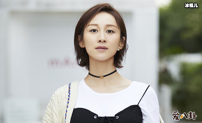 练束梅个人资料